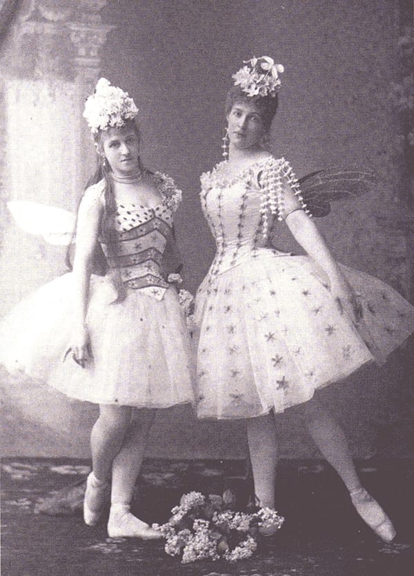 A photograph from 1890 of a 19th century dance production of "Sleeping Beauty", photo of two fairies